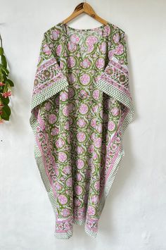 This Beautiful Hand Block Print Caftan Or Can Be Called As Tunic Is Made With Super Fine Quality Cotton And Designs Have Been Crafted By Hand Prints. Indian Handmade Floral Cotton Kaftan, Women Dress Long Caftan, Dress Beach Cover Up, Flower Hand Block Print Sleepwear Maxi Dress Kimono Rabe This Hand Block Printed Cotton Kaftan/Caftan packs super light and feels very soft and airy. * Measurement * (Bust Around - 50 Inches - 128 Cm) (Length - 53 Inches - 135 Cm) Fabric - 100% Cotton Print- Hand B Traditional Green Floral Print Kaftan, Traditional Green Floral Kaftan, Green Floral Print Long Sleeve Kaftan, Green Long Sleeve Kaftan For Loungewear, Green Long Sleeve Kurta For The Beach, Green Floral Print Tunic Kaftan, Traditional Spring Loungewear Dresses, Traditional Green Kurta For Vacation, Summer Beach Pink Kurta