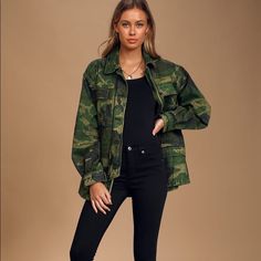 Excellent Condition Free People Seize The Day Military Jacket Size Xs Oversized Fit Sturdy Woven Cotton, Boasting A Classic Green And Black Camo Print, Shapes This Essential Utility Jacket With An Oversized Silhouette, And Long Sleeves With Button Cuffs. Collared Neckline Leads Into The Slouchy Zip-Front Bodice With An Additional Button Placket, Four Functional Flap Pockets, And A Hidden Drawstring Waist For A Custom Fit. Unlined. Shell: 100% Cotton Oversized Camouflage Winter Outerwear, Oversized Camouflage Outerwear For Winter, Long Sleeve Camouflage Outerwear For Spring, Winter Camouflage Oversized Outerwear, Oversized Military Spring Outerwear, Oversized Military Outerwear For Spring, Spring Camouflage Outerwear With Pockets, Oversized Military Utility Jacket For Spring, Camouflage Outerwear With Pockets For Spring