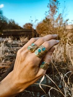 New raw geode rings. Apatite varieties to pick from and peridot.  The other rings from this series are available separately. You are buying one ring. To purchase multiples to stack add several to your cart. Gemstones are raw and rough, not polished or tumbled.  1. Peridot color is acid green with occasional white or brown banding.   2. Light Apatite is mint aqua green  3. Dark Apatite is solid deep aqua blue (no clear areas) 4. Navy Apatite is blue with darker blue flex Fine jewelry - solid bras Bohemian Fine Jewelry, Apatite Ring, Geode Ring, Peridot Color, Raw Stone Ring, Bohemian Rings, Aquamarine Rings, Raw Stone, One Ring