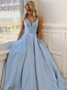 Simple V Neck Light Blue Satin Long Prom Dresses, V Neck Light Blue Fo — Bridelily Blue Satin Prom Dress, Prom Dress With Pockets, Sky Blue Prom Dress, Prom Dresses Simple, Special Occasion Gowns, Blue Prom Dress, Light Sky Blue, Prom Dresses With Pockets, Simple Prom Dress