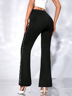 These Black Pearl Beaded High Waist Flare Pants are extremely comfortable and stylish, designed with high-quality vegan leather and unique beading detail. The high waisted design gives you a flattering figure and the perfect amount of coverage, making them a great choice for any occasion. Fabric Type: 90% Polyester, 10% Elastane Care Instructions: Hand Wash Only Closure Type: Pull On Embellished High Waist Bottoms For Night Out, Black Embellished Wide Leg Bottoms, Embellished High-waist Pants For Night Out, High Waist Embellished Pants For Night Out, Embellished High Waist Pants For Night Out, Black Embellished Evening Pants, Fitted Black Embellished Pants, Fitted Embellished Black Pants, Embellished Black Pants For Evening