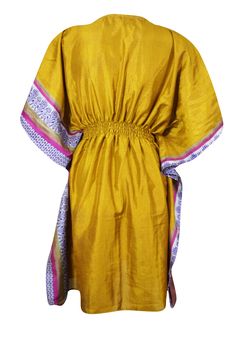 Indulge in the luxurious comfort of this beautiful Women Sari Kaftan Dress. Packed with personality, this blue and yellow print dress is sure to be your favorite layering piece! Crafted from light and airy fabric with one-size fit, wrap yourself in cozy warmth and elegance every time. The kimono caftan works well as a beach short dress and is great for travel and vacations. Kaftans are easy to dress up with jewelry and stylish shoes and fit all misses and plus size bodies. A kaftan with kimono s Yellow Spring Tunic For Beach, Spring Yellow Tunic For Beach, Spring Yellow Beach Tunic, Gold Kaftan For Summer Vacation, Yellow Tunic Dress For Summer, Yellow Tunic Summer Dress, Yellow Spring Beach Tunic, Yellow Tunic Dress For The Beach, Bohemian Yellow Dress With Kimono Sleeves