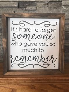 a framed sign that says it's hard to forget someone who gave you so much to remember