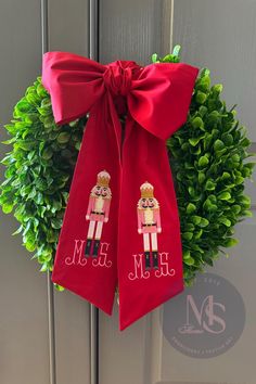 a christmas wreath with an image of a nutcracker on it