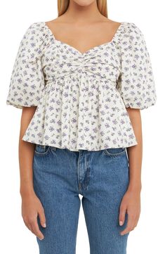 This flowery puff-sleeve blouse designed with a smocked back and a flouncy finish. Sweetheart neck Elbow-length sleeves Lined 100% cotton Dry clean Imported Floral Puff Sleeve Top, Sweet Heart Neckline, White Short Sleeve Tops, English Factory, Woman Looking, Striped Midi Dress, Pleated Midi Dress, Puff Sleeve Blouse, Sweet Heart