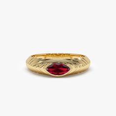 This 14k Gold ring boasts a unique step-beveled design and features a sparkling 7x3.5 MM marquise cut red garnet, a perfect birthstone for January. The modern design makes it suitable for everyday wear and the red garnet adds a pop of color to the piece. The step-beveled design adds depth, and the 14k Gold gives it a touch of luxury. This ring is perfect for anyone born in January or anyone who loves the color red. Features: * Made to Order * Gold Kt: 14K Solid Gold (also available in 18K) * Ava Beveled Ring, Born In January, Bezel Set Engagement Ring, January Birthstone Rings, Gold Armband, Local Jewelry, January Birthstone, Garnet Ring, Ring Setting