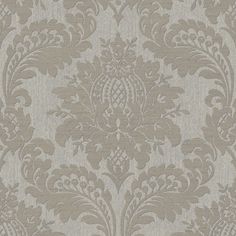 an ornate wallpaper pattern in grey and beige