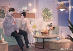 two people are sitting on a couch in a room with flowers and candles around them