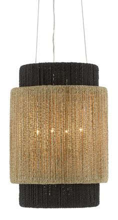 a chandelier hanging from the ceiling with black and beige fabric on it's sides