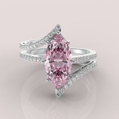 Mohana Jewels Featuring Verveux - Pink Color Marquise Cut Diamond Ring | Elegant Double Pave Setting | Certified Dazzle your special someone with this dazzling Verveux pink color marquise cut diamond ring! Exquisitely designed with an elegant double pave setting and centered with a beautiful Moissanite diamond, this ring will sparkle and shine for years to come. Show your love with the perfect ring! Material Selection : 10K, 14K, 18K Solid Gold Metal Color Selection : Rose Gold, Yellow Gold, Whi Marquise Cut Diamond Ring, Cushion Ring, Pave Setting, Platinum Jewelry, Marquise Cut Diamond, Gold Platinum, 1 Carat, Moissanite Diamonds, Diamond Clarity