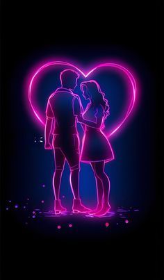 two people standing next to each other in front of a neon heart