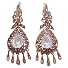 An absolutely superb pair of rose-cut diamond earrings from the Georgian ( 1830s ) era. these incredible earrings are crafted in 9k gold-topped silver and feature a sparkling array of rose cut diamonds , approximately 6 carats , F/G color , VVS clarity . Vintage Drop Earrings, Georgian Jewelry, Rose Vintage, Fashion Aesthetics, Rose Cut Diamond, Rose Cut, Antique Jewelry, Diamond Earrings, Diamond Cuts