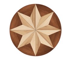 a wooden table top with a star design on the center and two smaller stars in the middle