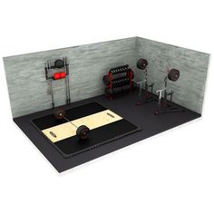 an exercise room with various equipment on the floor