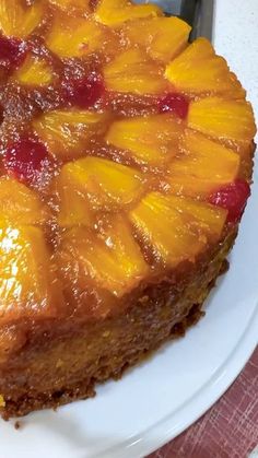 a pineapple upside down cake on a white plate