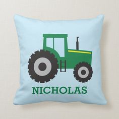 a green tractor with the name nicholas on it throw pillow from zazzles com