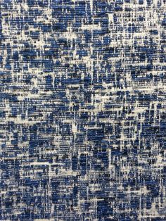 an abstract blue and white rug