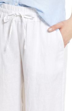 Crafted from lightweight linen, these tie-waist pants feature breezy wide legs for vacation-ready vibes. 31" inseam; 11" leg opening; 11 1/2" front rise; 16 1/2" back rise 100% linen Machine wash, tumble dry Imported Breezy White Linen Bottoms, H&m Linen Pants, White Breezy Linen Bottoms, Pull-on Linen Pants For Vacation, Linen Wide-leg Beach Pants, Tie Waist Pants, Tommy Bahama, Linen Pants, Drawstring Waist