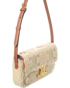 About The Brand: Classic, Coveted Parisian Chic. Made In Italy Claude Shearling Shoulder Bag In Beige Shearling And Leather And Gold-Tone Hardware With Logo Accent Interior Design Details: Leather Interior, Wall Pocket Measures 8In Wide X 5In High X 2In Deep Adjustable Shoulder Strap Drops 10In Fold-Over Flap With Magnetic Closure Please Note: All Measurements Were Taken By Hand And Are Approximate; Slight Variations May Occur. Our Products Are 100% Genuine. In Some Cases We Purchase Merchandise Interior Design Details, Brand Owner, Balenciaga Designer, Parisian Chic, Interior Wall, Wall Pockets, Leather Interior, Magnetic Closure, Luxury Branding