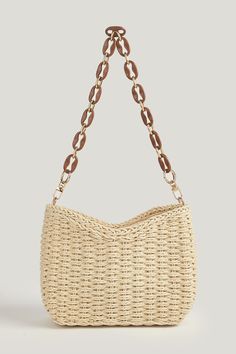 Make a statement with the Chainlink Shoulder Strap Crochet Bag. Its unique crochet design paired with a chic chainlink shoulder strap blends texture and trend for an accessory that's perfect for any occasion. Product code: CAC12F4G008GG Features:  Material: 100%STRAW. Chic Natural Shoulder Bag, Beige Chain Strap Beach Bag, Beige Straw Bag With Chain Strap For Everyday Use, Beach Shoulder Bag With Chain Strap, Summer Beach Shoulder Bag With Chain Strap, Beach Shoulder Bag With Chain Strap For Summer, Rectangular Straw Bag With Chain Strap For Vacation, Trendy Woven Bags As Fashion Accessory, Trendy Beach Bag With Chain Strap