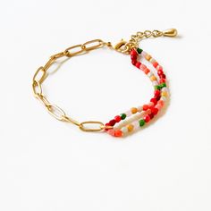 A unique combination of a matte gold-plated paperclip chain and colorful beads,  the bracelet measures 6.5" with a 1" extension. The tiny 3mm faceted glass beads are Czech glass, and the bracelet is adjustable and fun! The details: 3mm Czech glass beads 24K Matte gold chain Shipped in a gift box. Handmade in our Burlington VT studio. Trendy Beaded Chain Bracelet, Tiny Bead Bracelet, Bracelet With Beads, Paperclip Bracelet, Burlington Vermont, Burlington Vt, Gold Chain Bracelet, Box Handmade, Gold Bracelet Chain