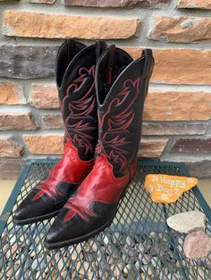 Vintage women's 1980s  Laredo red and black inlay cowboy boots with stitch detail on shaft. in near perfect condition.  Measurements: Sole: 12 3/4 ( approximately ) Ball: 3 3/4 Height: 13 Heel: 2 Please check measurements! Vintage cowboy boots run small! Cowboy Vampire, Red Metallic Cowboy Boots, Luxury Red Cowboy Boots With Round Toe, Tall Red Cowboy Boots, Luxury Red Western Cowboy Boots, Vintage Red Cowboy Boots, Cowboy Boots Black, Boots Mid Calf, Red Cowboy Boots