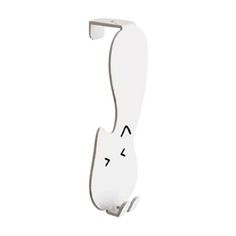 a white cat shaped door handle on a wall