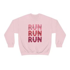 "Crafted with high-quality Gildan sweatshirt material, this minimalist Running Crewneck is designed for comfort and durability during your runs. With its classic design, it can easily be paired with any running shorts or leggings. This sweatshirt for Runners is perfect for both seasoned runners and those just starting out. Its simple yet stylish design features the word \"RUN FOR YOUR MIND, RUN FOR YOUR BODY, RUN FOR YOUR SPIRIT\" boldly printed on the front, making a statement wherever you go. Sporty Pink Sweatshirt With Screen Print, Pink Sporty Sweatshirt With Screen Print, Pink Sports Sweatshirt With Graphic Print, Running Outfits, Running Partner, Marathon Gift, Running Marathon, Gifts For Runners, Gildan Sweatshirts