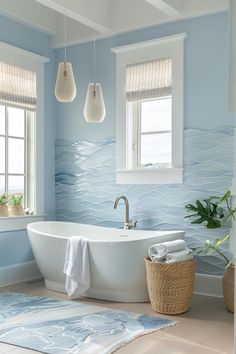 a white bath tub sitting under two windows next to a rug and window sill