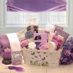 a white basket filled with lots of purple items