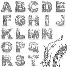 an alphabet made out of barbed wire with the letters and numbers drawn in it's outline