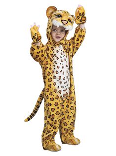 a child in a costume that is wearing a leopard suit and holding his hands up