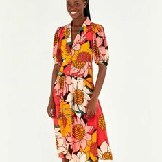 Give Yourself Some Bold Flowers! The Colorful Sunflowers Midi Dress Is So Fresh That You’ll Want To Wear It On Repeat. It Features A Cozy Fit With A Standout Neckline And Brings One Of Our Must-Have Prints Of The Season. Have You Noticed The Sunflower-Shaped Buttons? It’s So Mind-Blowing! Vibrant Floral Print Midi Dress, Vibrant Short Sleeve Midi Dress For Spring, Multicolor Short Sleeve Midi Dress For Garden Party, Vibrant Floral Print Dress For Garden Party, Vibrant Floral Dress For Garden Party, Retro Floral Print Midi Dress For Daywear, Multicolor Dress With Vibrant Print For Daywear, Multicolor Dresses With Vibrant Print For Daywear, Retro Floral Print Beach Midi Dress