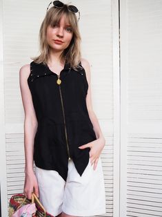 Vintage 90s black zipped chain back sleeveless top blouse Top is in great vintage condition. SIZE. Model usually wears UK 6-8 / XXS-XS, top could fit UK 8-10 / XS-S. Please, check the measurements before buying. MEASUREMENTS. Bust - 86 cm, waist - 74 cm, length - 61 cm. Item is made from mixed material. Color may differ slightly depending on the color calibration of the device you're viewing on. If You have more questions about products or shipping, please drop me a message. Wish You great shopp Casual Sleeveless Top With Zipper Closure, Chic Vest With Zipper Closure, Summer Party Tops With Zipper Closure, Black Sleeveless Top With Back Zipper, Sleeveless Black Top With Back Zipper, Chic Sleeveless Vest With Zipper Closure, Black Zipper Closure Top For Summer, Black Top With Zipper Closure For Summer, Black Summer Top With Zipper Closure