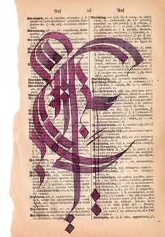 an old book with some type of calligraphy on it's page, in purple ink