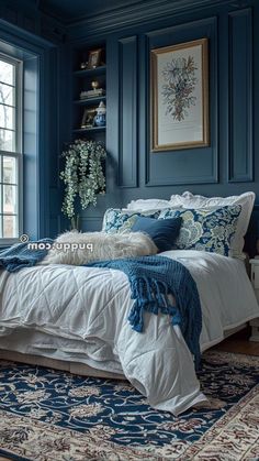 a bedroom with blue walls and white bedding