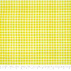 a yellow and white checkered fabric with a ruler in front of the bottom half