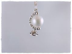 "3D Sterling silver and acrylic white pearl globe stand charm measures 23x14mm. The acrylic pearl measures 10mm. Chain lengths range from 14 to 30 inches (even lengths). The length shown in the photo is 18 inches. More Chain Styles: http://etsy.me/2nUVyqL It comes beautifully gift wrapped; perfect for gift giving! Want just the charm? Choose \"Charm Only\" from the drop down box to checkout. More World Jewelry: http://etsy.me/1RYjaAE If you have any questions, please contact me before you checko White Spherical Jewelry For Gifts, White Spherical Jewelry Gift, Globe Stand, Globe Necklace, Earth Globe, Silver Pearls, White Pearl, Chain Styles, Cable Chain