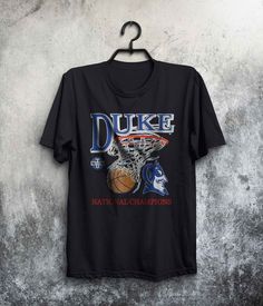 "Duke Blue Devils t-shirt Duke College Basketball Championships, Unisex t-shirt, Men t-shirt, Women t-shirt, T-Shirt  100% preshrunk cotton  Double-needle sleeve and bottom hem  Loose Fit Color ash is 98% cotton and 2% polyester SIZES : S M L XL 2XL CHEST WIDTH 18\" 20\" 22\" 24\" 26\" HEIGHT 28\" 29\" 30\" 31\" 32\" SLEEVE LENGTH 16-1/2\" 18\" 19-1/2\" 21\" 22-1/2\"" Duke Shirt, Duke College, Basketball Championship, Clothes Wishlist, Duke Blue Devils, Blue Devil, Champion Shirt, Future Lifestyle, College Basketball