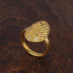 Tree Of Life Ring, Engraved Tree Ring in Gold, Signet Gift, Lace Ring, Stackable Ring, Midi Ring, Filigree Ring, Popular Ring. ♥ DETAILS ♥ *Materials: Brass *Size: All sizes are available. ♥ DELIVERY ♥ *IMPORTANT: Before placing an order, please double check your delivery address is correct and complete to avoid delays and lost packages. *You can return your purchased item within 15 days after successful delivery. *We offer a 100% "Money Back Guarantee" if you are not satisfied with your purchas Matte Gold Brass Rings For Gift, Matte Gold Brass Rings As Gifts, Gold Oval Brass Rings, Oval Gold Brass Rings, Matte Gold 14k Gold Rings For Gift, Matte Gold 14k Rings For Gifts, Elegant Nickel-free Gold Rings, Everyday Gold Brass Midi Rings, Elegant Gold Brass Midi Rings