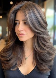 Amp up the volume with brunette butterfly layers! 🌟 This voluminous cut adds body and bounce while enhancing the natural richness of brunette hair. Perfect for a bold, fluttery, and effortlessly glamorous style! 💃✨ Butterfly Layers Dark Brown Hair, Butterfly Haircut Volume, Layered Haircuts For Medium Hair Brunette, Layered Haircut For Volume, Haïr Cut For Volume Hair, Long Layers Butterfly Cut, U Cut With Long Layers, Layered Hair With Side Part, Medium Length Hair With Layers Unstyled