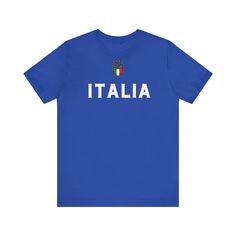 A classic vintage-looking Italia T-Shirt in two different colours. Great to style.  Crop it and wear it also as a crop top! Available in all sizes. This classic unisex jersey short sleeve tee fits like a well-loved favorite. Soft cotton and quality print make users fall in love with it over and over again. These t-shirts have-ribbed knit collars to bolster shaping. The shoulders are tapered for a better fit over time. Dual side seams hold the garment's shape for longer.    .: The tear-away label Football Season Logo Print Crew Neck T-shirt, Retro Team Name T-shirt For Fans, Blue Retro T-shirt For Sports Events, Retro Blue T-shirt For Sports Events, Team Spirit Short Sleeve T-shirt For Football Season, Retro Short Sleeve Tops With Team Logo, Crew Neck Football Season Fan Shirt, Blue T-shirt With Football Season Screen Print, Football Season Fan Merchandise Shirt With Crew Neck