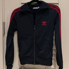 Adidas Size S Blue And Red Track Jacket And Sweatpant Set. New Without Tags. Casual Red Tracksuit For Fall, Red Casual Tracksuit For Fall, Navy Long Sleeve Winter Tracksuit, Red Long Sleeve Tracksuit For Fall, Red Sporty Tracksuit For Fall, Sporty Red Tracksuit For Fall, Sporty Red Fall Tracksuit, Adidas Long Sleeve Track Jacket With Pockets, Adidas Casual Red Track Jacket