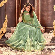 Pista Green color saree is made from georgette which is highlighted with beautiful printed with embroidered border work. Comes along unstitched mono silk blouse piece which you can customise as per your design/style. Occasion - You can wear this saree for festive and functions. Note:- The actual product may differ slightly in color and design from the one illustrated in the images when compared with computer or mobile screen. Measurements: Saree : Georgette : 5.5 Mtrs Blouse : Georgette : 0.8 Mt Green Georgette Choli With Cutdana, Green Sharara With Embroidered Border For Navratri, Pista Green Sharara With Embroidered Border For Navratri, Pista Green Georgette Pre-draped Saree With Dupatta, Green Semi-stitched Sharara With Embroidered Border, Semi-stitched Green Sharara With Embroidered Border, Diwali Semi-stitched Lehenga With Printed Border, Green Pre-draped Saree With Printed Border For Navratri, Designer Organza Pre-draped Saree With Embroidered Border