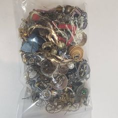 a bag filled with lots of different types of buttons