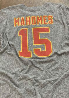 Patrick Mahomes Kansas City Chiefs Grey Name and Number Short Sleeve Fashion Player T Shirt - 18240915 Throwback Sports Team Tops, Throwback Team Tops For Sports Events, Throwback Sports Tops With Team Logo, Baseball Season Fan Merchandise Top With Team Name, Team Name Tops For Baseball Season Fan Merchandise, Baseball Season Tops With Team Name For Fan Merchandise, Fan Merchandise Tops With Team Name For Baseball Season, Throwback Tops With Team Logo For Fans, Throwback Tops With Letter Print For Sports Events