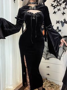 Vampire Spider Witch Demon Cosplay Sheer Side Dress Adult Halloween Costume This fantasy cosplay Halloween costume will definitely turn heads.Very versatile as a zombie, vampire, spider witch, spooky corpse bride.Sheer accent sides with spider web lace. Maxi dress with a high leg slit on one side.Plunge V-neck with corset lace-up accent.Cropped asymmetrical long-sleeve hooded shrug cape.Super soft velvet-like material. Details:Color: BlackLength: MaxiMaterial: 95% polyester 5% spandexTexture: ve High Split Dress, Velvet Slip Dress, Morticia Addams, Suspenders For Women, Goddess Dress, Lace Side, Lace Cutout, High Waist Dress, Looks Street Style