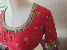 "Vermilion red Saree blouse in the softest Maheshwari silk cotton fabric and luxurious embroidery.   Gorgeous combination of bright red and bottle green with exclusive golden hand embroidery, antique flat sequins and pitta zardosi, antique badla work royal silver and golden peacocks on the sleeves, elegant neckline, floral booties that sparkle and make this an apt choice for any special occasion, be it is for a festival, wedding, or any party.  Pot neck style with high neck, back hooks, royal elegance  Size: 40\"  (Size can be downsized or upsized for additional alteration charge) Very elegant and much more gorgeous in person than in pictures!" Festive Top With Resham Embroidery And Traditional Drape, Festive Cutdana Tops With Traditional Drape, Traditional Tops With Intricate Embroidery For Reception, Red Art Silk Blouse For Diwali, Red Silk Embroidered Fabric For Reception, Traditional Embroidered Tops For Reception, Traditional Chinon Blouse For Party, Elegant Red Top With Intricate Embroidery, Traditional Chinon Party Blouse