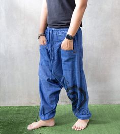 "The harem style trousers made from cotton fabric 100%with an elasticated smock waist and ankles they provide a comfortable lightweight fit, perfect for casual wear, festivals, yoga, holidays as well as pairing with a plain top to get that popular look. Materials: Cotton Sizing: One size fits most. Size : (inches) ✿Waist 24\" (61 cm) stretching to 46\" (elastic material) (116 cm) ✿ Hip 30\"- 48\" ( 76-121 cm ) ✿ Length 40\" ( 101 cm ) ✿ Length around each legs: 10\" (25 cm) can be stretch (elast Casual Cotton Harem Cargo Pants, Cotton Harem Parachute Pants With Pockets, Blue Cotton Harem Pants With Pockets, Blue Cotton Harem Pants With Side Pockets, Cotton Yoga Pants With Tapered Leg, Traditional Cotton Parachute Pants With Pockets, Blue Cotton Harem Pants Loosely Fitted At Hips, Blue Cotton Harem Pants For Festival, Blue Harem Pants