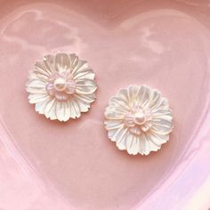 Mother of Pearl Flower Stud, Bridesmaids Medium Flower Stud, Pearl Flower Bridesmaids Earrings, Bridesmaids Shell Flower Post Earrings Mother of Pearl white flower studs are embellished with small freshwater pearls. These would make a perfect Bridesmaids gift! These are a Mother of Pearl flower plus a small natural pink Mother of Pearl flower embellished with a tiny pearl. This size is app. 1 1/8 inch. Great your special day or everyday. The posts are solid .925 Sterling Silver for sensitive ear Handmade Petal Flower Earrings For Wedding, Petal-shaped Flower Charm Earrings For Wedding, Wedding Flower Charm Earrings, Wedding Flower Petal Earrings With Charm, Wedding Flower Petal Earrings With Flower Charm, 3d Petal Flower Earrings For Wedding, 3d Floral Petal Earrings For Wedding, Feminine Flower-shaped Pearl Earrings For Weddings, Feminine Pearl Flower Earrings For Weddings